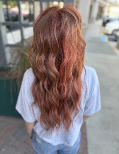 Warm auburn to copper balayage blend on long layered hair, Cary, NC